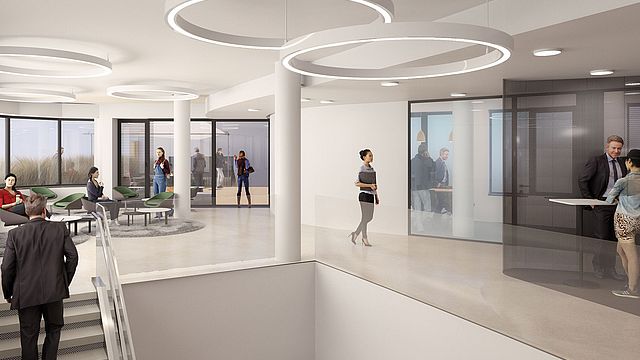 In jedem Stockwerk gibt es einen Lobby-Bereich, der informellen Austausch fördert. Symbolbild © Maurer & Partner Architekten